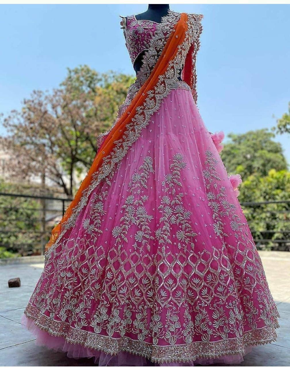 Bewildering Pink Color Wedding Wear Net Chine Stitched Work Lehenga Choli