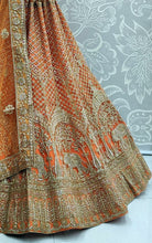 Load image into Gallery viewer, Bridal Wear Orange Color Designer Soft Net Zari Diamond Thread Embroidered Work Indian Wear Lehenga Choli
