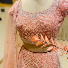 Load image into Gallery viewer, Stunning Peach Color Heavy Sequence Coding Work Semi Stitched Lehenga Choli
