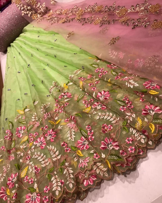 Glamorous Green Color Organza Stone Work Lehenga Choli For Women