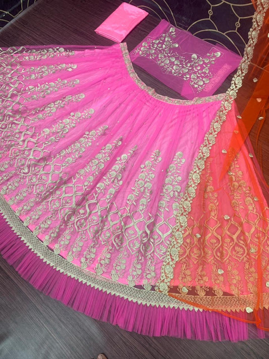 Sizzling Rani Pink Color Function Wear Soft Ruffle Net Chine Work Lehenga Choli