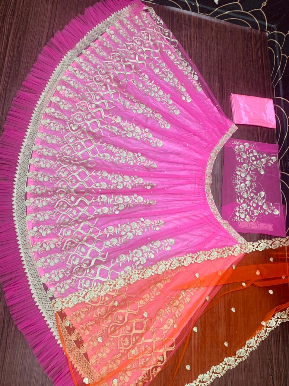 Sizzling Rani Pink Color Function Wear Soft Ruffle Net Chine Work Lehenga Choli