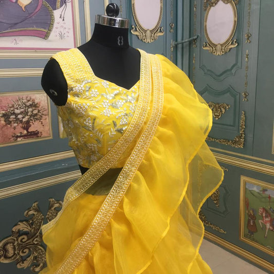 Shattering Yellow Color Occasion Wear Organza Embroidered Fancy Ruffle Work Lehenga Choli Design