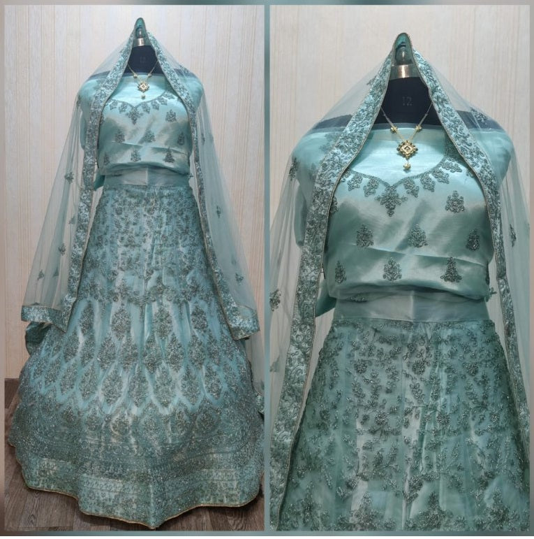 Wedding Wear Light Color Soft Net Glitter Coding Embroidered Lehenga Choli