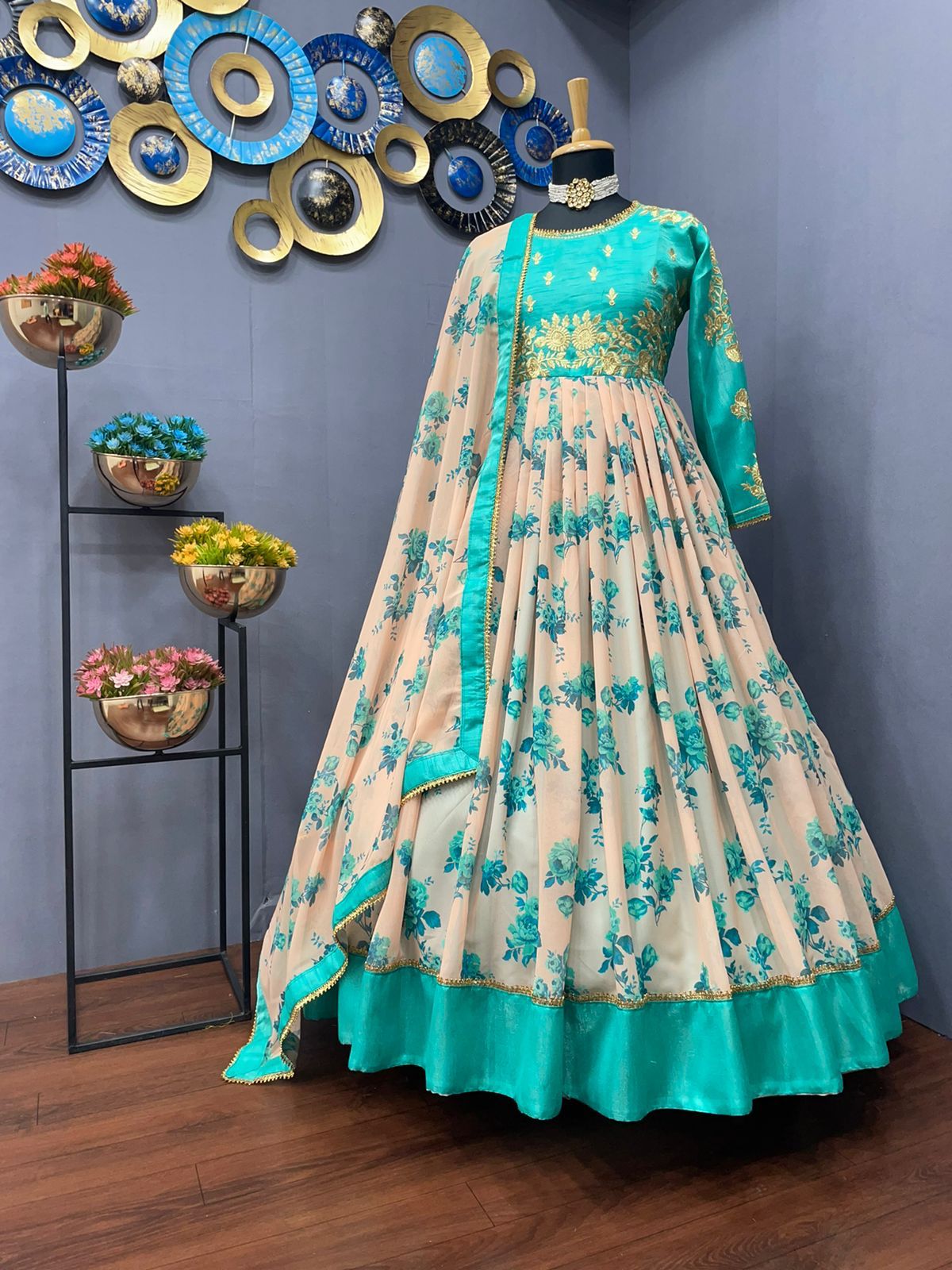 Good-looking Firozi Color Georgette Satin Design Printed Embroidered Work Gown