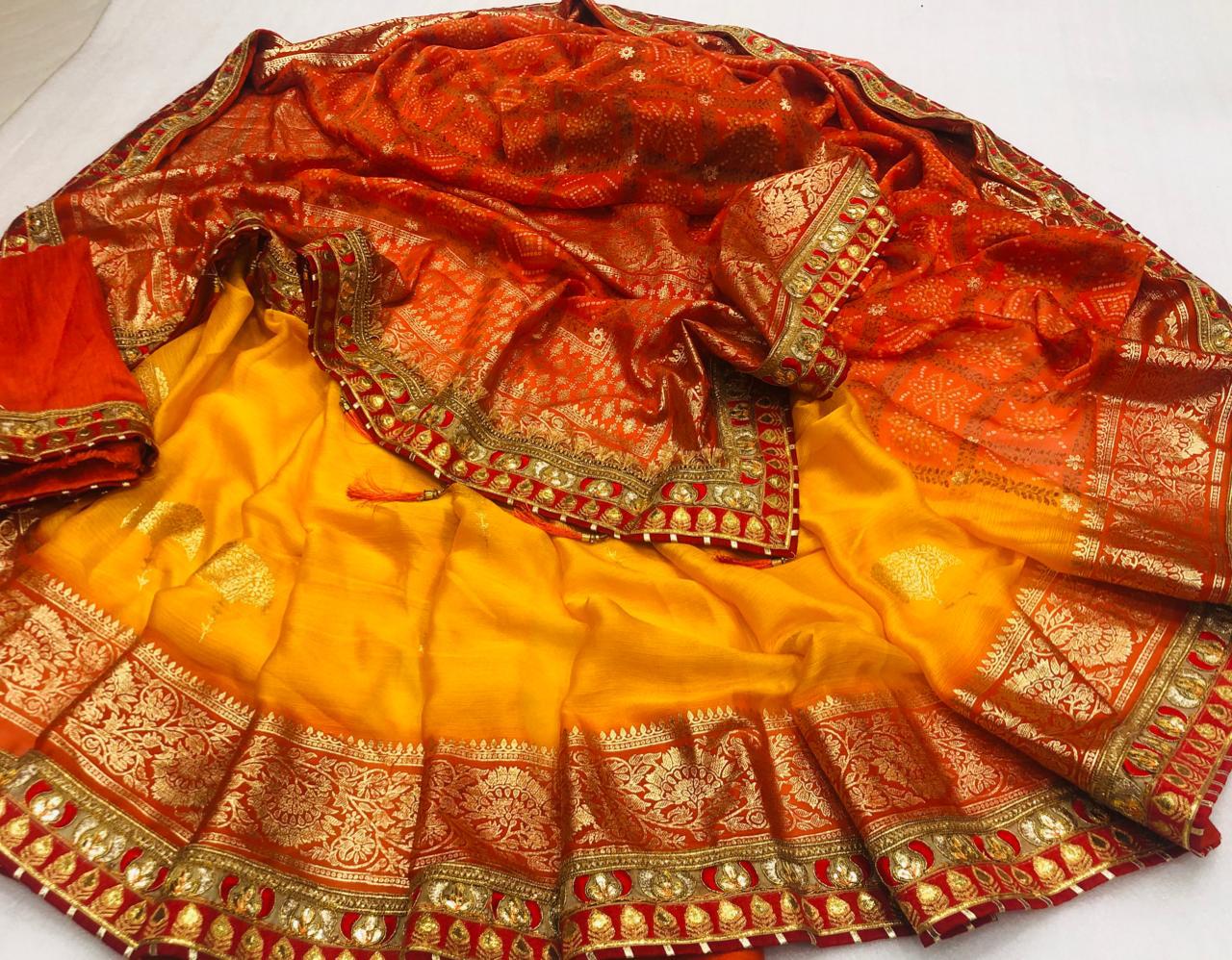 Occasion Wear Stupendous Orange Color Moss Soft Chiffon Printed Gotta Patti Work Bandhej Saree Blouse
