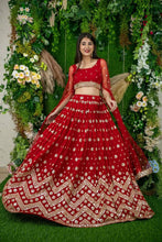 Load image into Gallery viewer, Wedding Wear Red color Soft Net Embroidered Lehenga Choli
