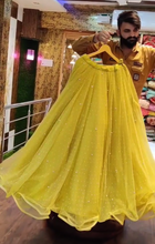 Load image into Gallery viewer, Unique Lemon Yellow Soft Net Semi Stitched Designer Lehenga Choli For Girls
