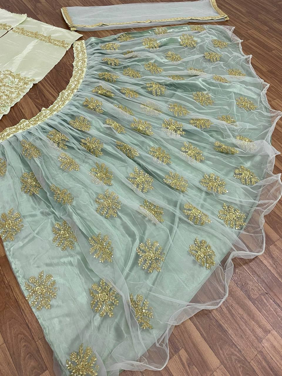 Blooming Green Color Net Function Wear Sequence Work Lehenga Choli