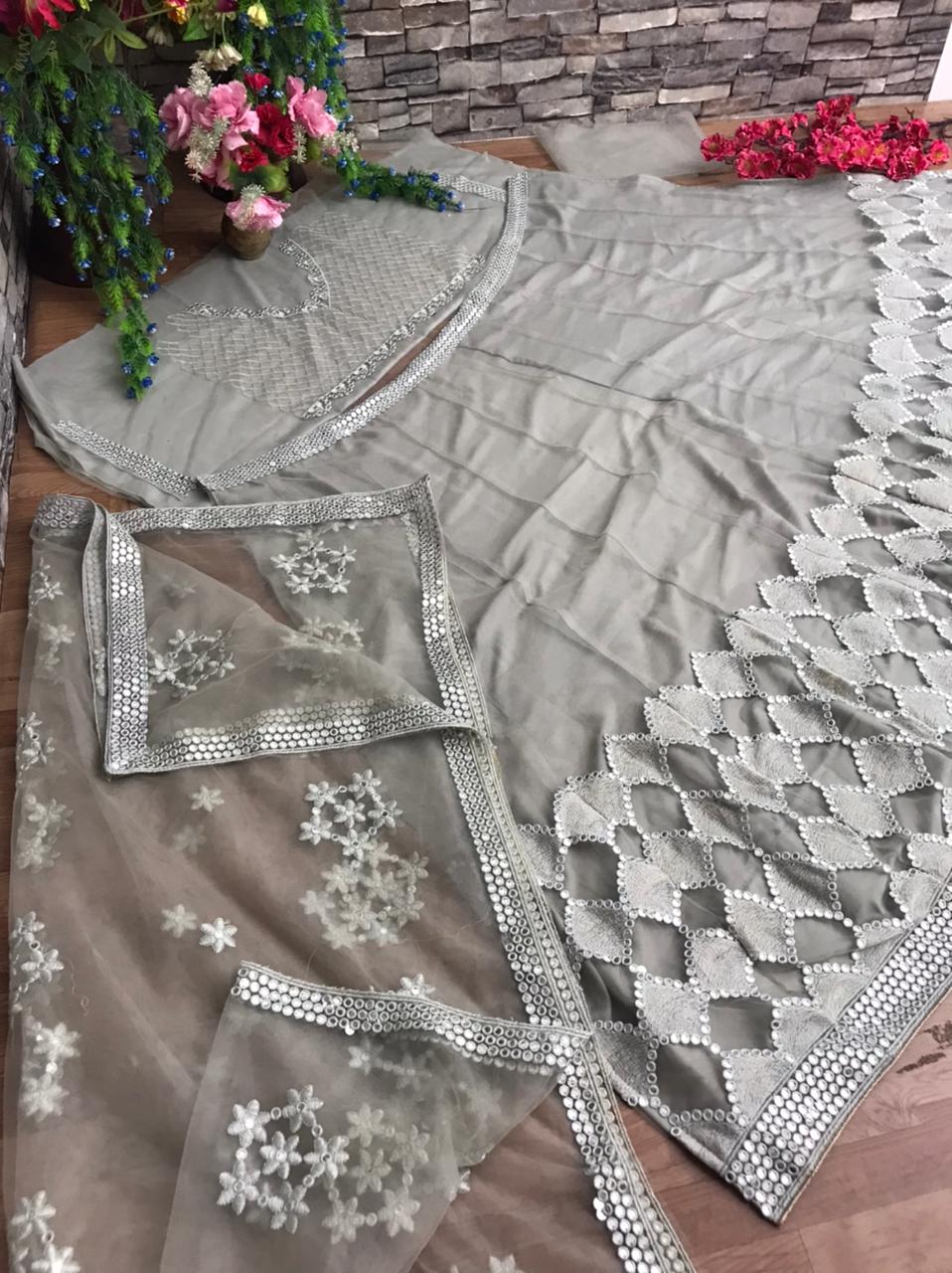 Surpassing Grey Color Festive Wear Net Designer Sequence Embroidered Work Lehenga Choli