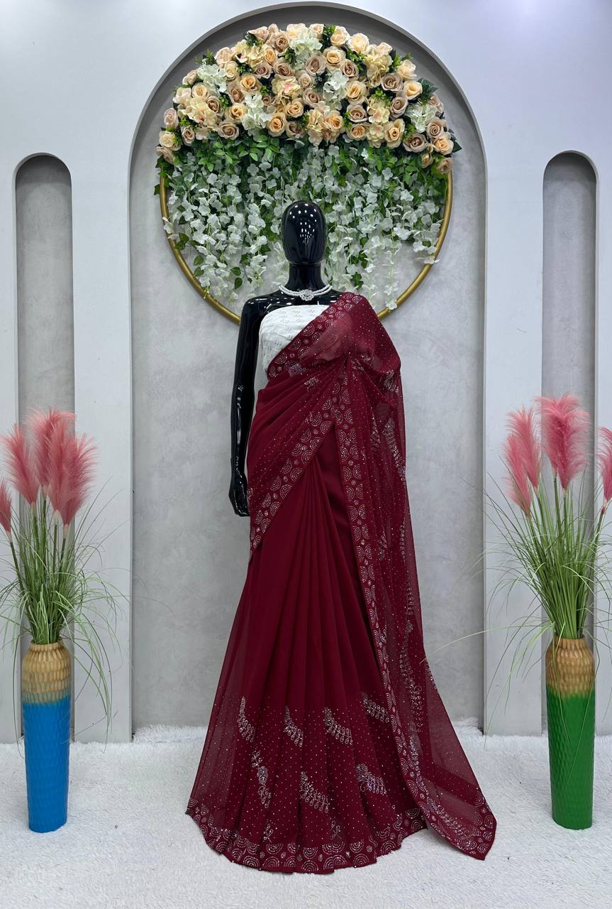 Looking Beautiful Designer Saree On Faux Georgette Febric With Hot Fix Work And Blouse Faux Georgette Febric With Thred With Sequence Work